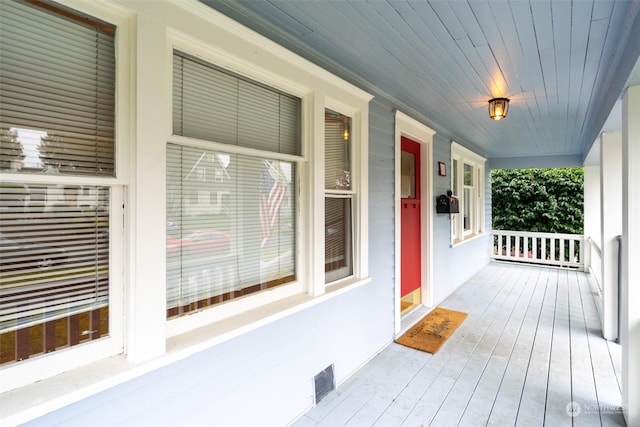 wooden deck with a porch