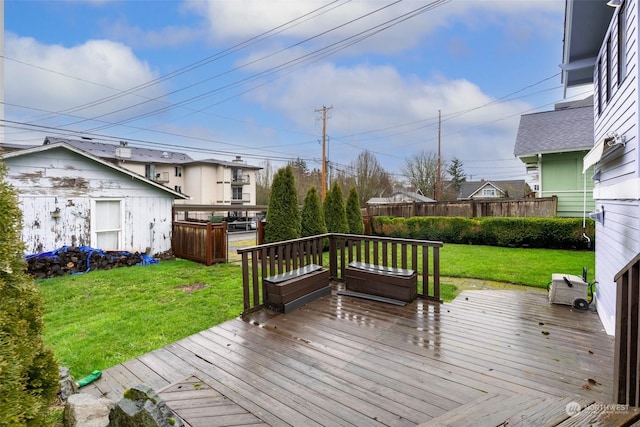 wooden deck with a yard