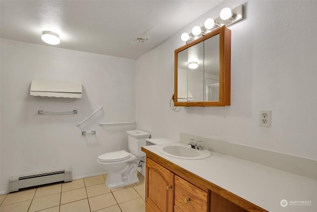 bathroom with tile patterned flooring, vanity, baseboard heating, and toilet