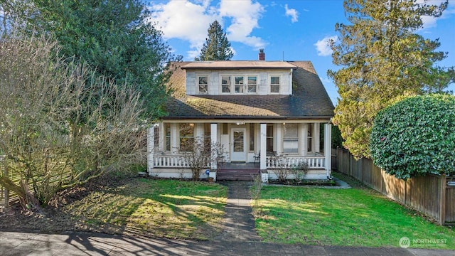 view of front facade with a porch and a front yard