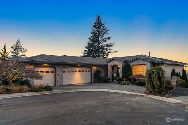 prairie-style house with a garage