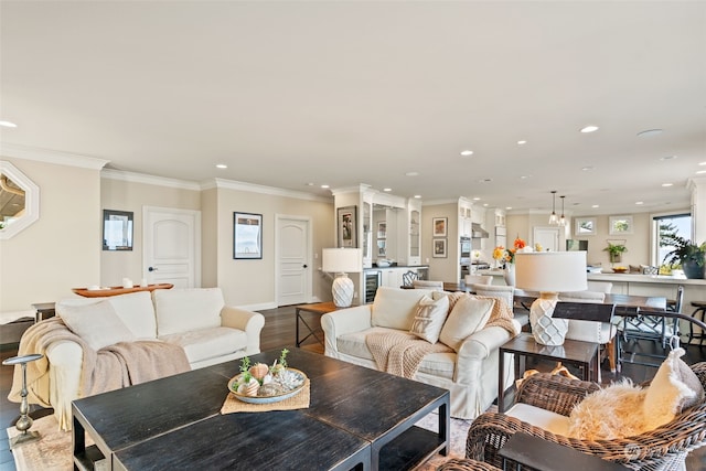 living room with crown molding and wood-type flooring