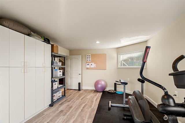 workout area with light wood-type flooring