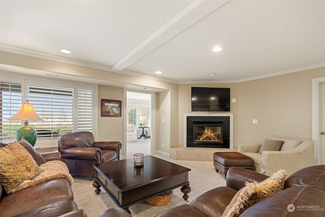 living room with a tiled fireplace, crown molding, and beam ceiling