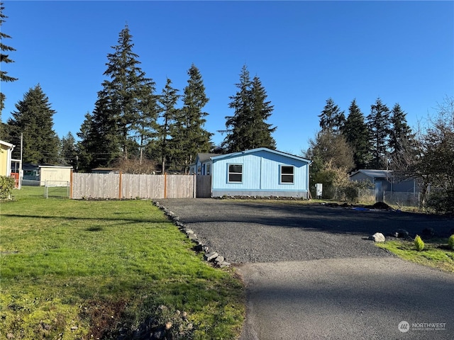 exterior space featuring a front lawn