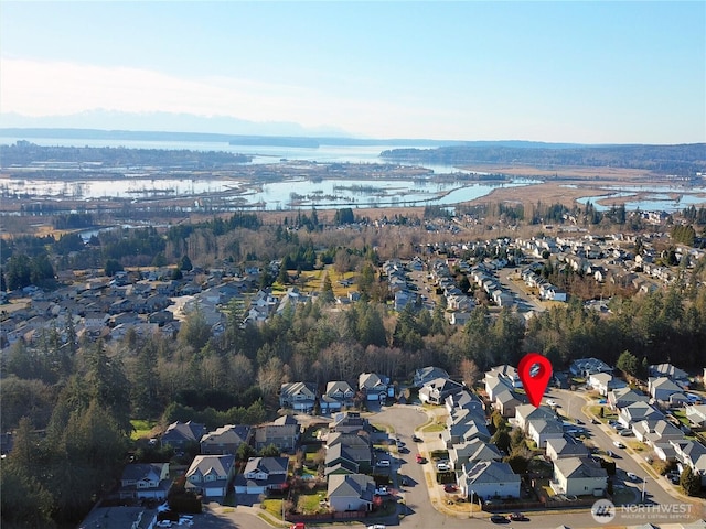 drone / aerial view featuring a water view