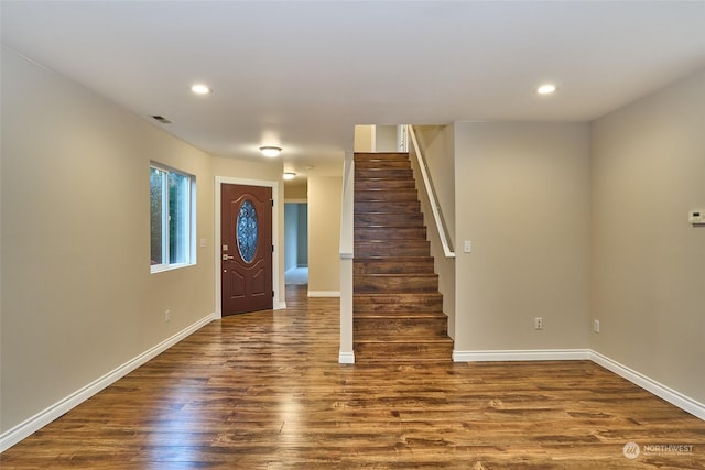 foyer entrance with wood-type flooring