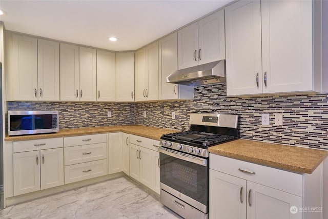 kitchen featuring decorative backsplash and stainless steel appliances