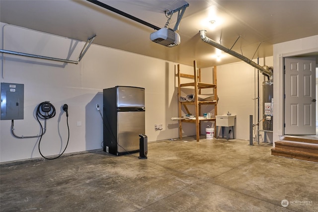 garage with gas water heater, sink, stainless steel fridge, electric panel, and a garage door opener