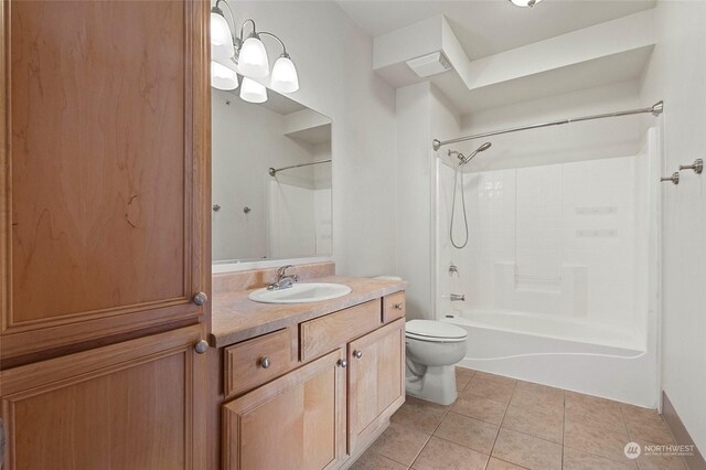 full bathroom with vanity,  shower combination, tile patterned floors, and toilet