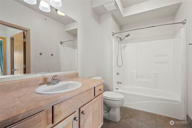 full bathroom featuring tile patterned flooring, vanity, toilet, and shower / bath combination