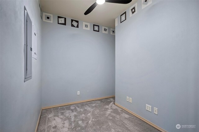 empty room featuring carpet and ceiling fan