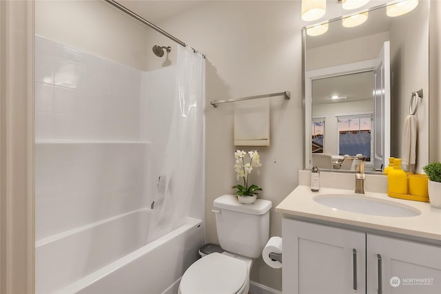 full bathroom featuring shower / tub combo, vanity, and toilet