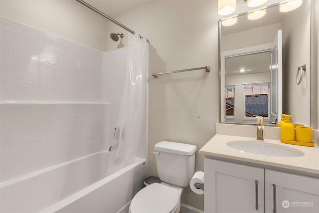 full bathroom with shower / bath combo, vanity, and toilet