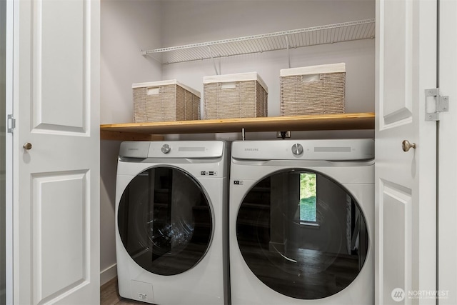 washroom with laundry area and washer and clothes dryer