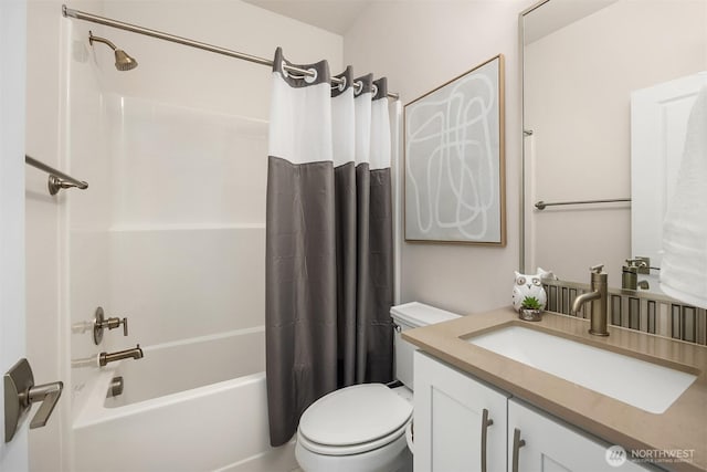 bathroom with toilet, shower / bath combination with curtain, and vanity