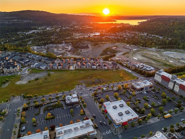 aerial view at dusk with a mountain view