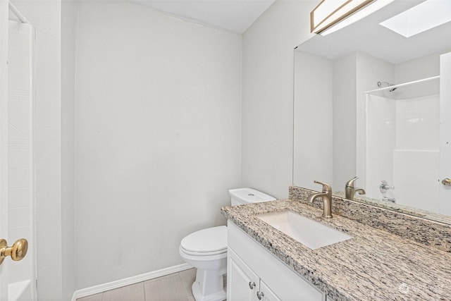 full bathroom with shower / bathtub combination, vanity, toilet, and a skylight