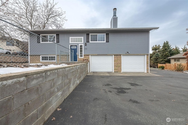 raised ranch with a garage