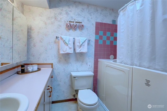 bathroom with vanity, toilet, and a shower with shower curtain