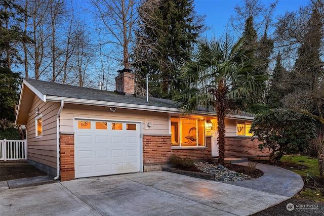 ranch-style home with a garage