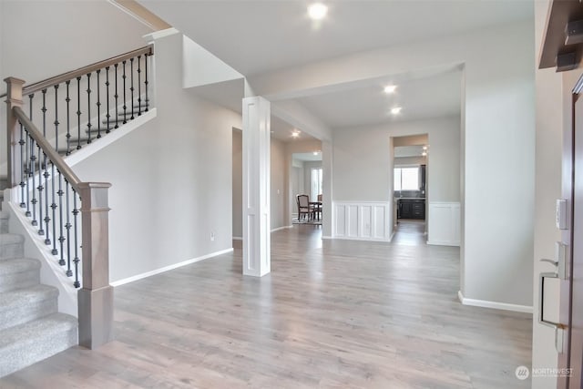 entrance foyer featuring light wood-type flooring