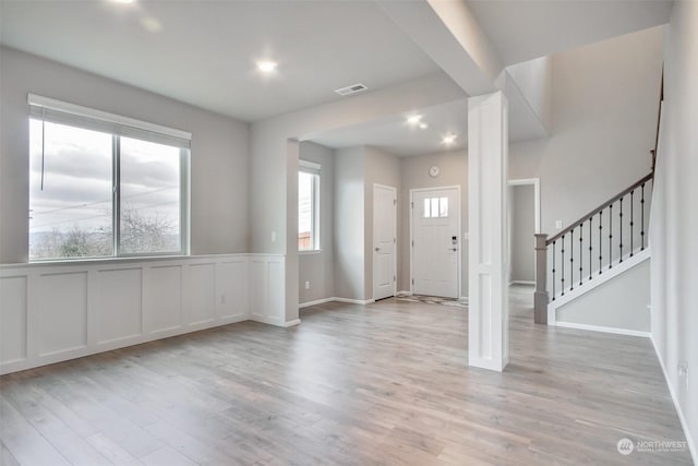 foyer with light wood-type flooring