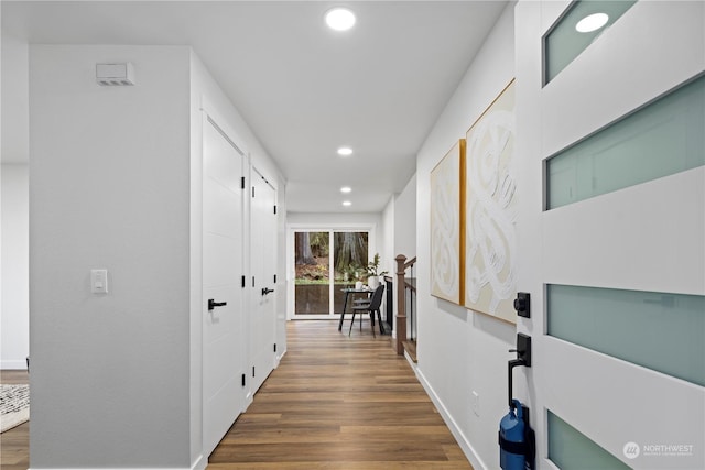 hall featuring dark wood-type flooring