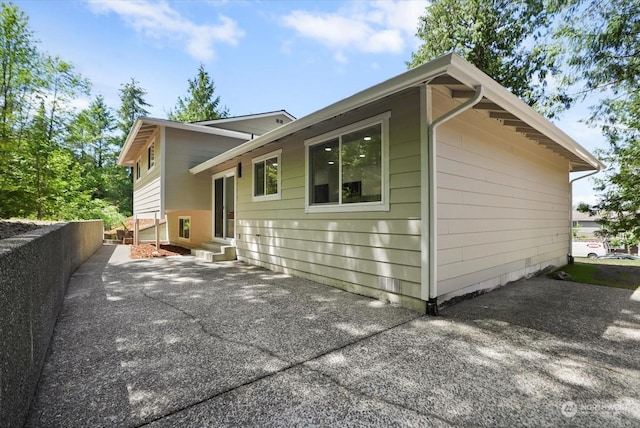 rear view of property with a patio