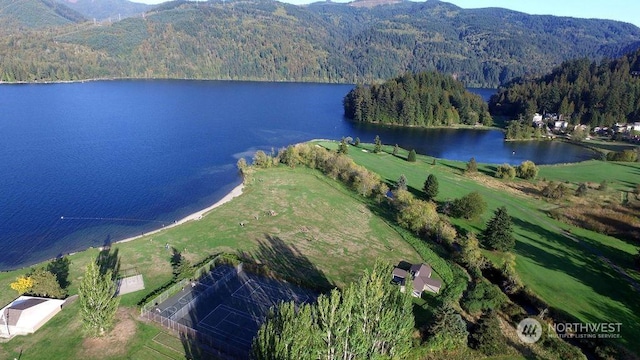 bird's eye view with a water and mountain view