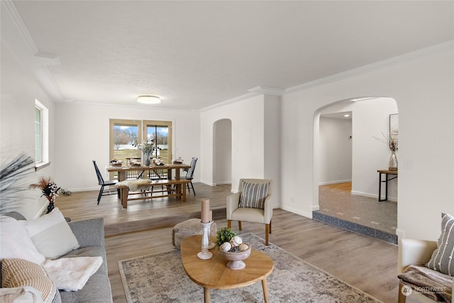 living room featuring crown molding and hardwood / wood-style floors