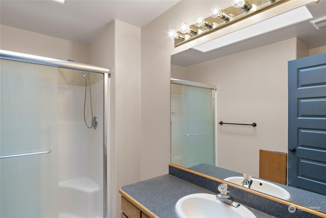 bathroom featuring vanity and walk in shower