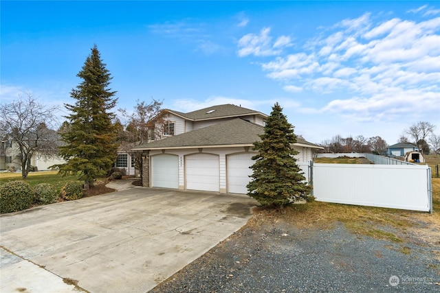 view of property exterior with a garage