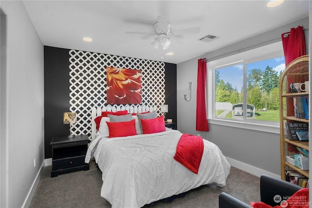 carpeted bedroom with ceiling fan