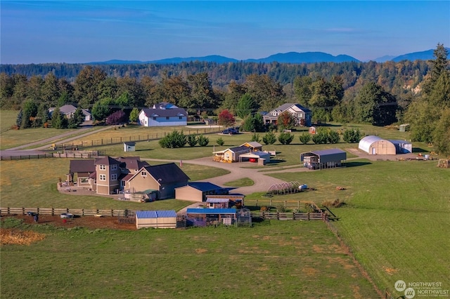 bird's eye view with a mountain view and a rural view