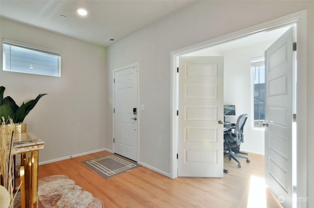 foyer entrance featuring light hardwood / wood-style flooring