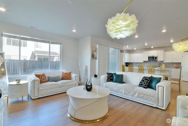 living room featuring light wood-type flooring