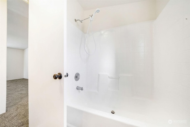 bathroom with shower / tub combination