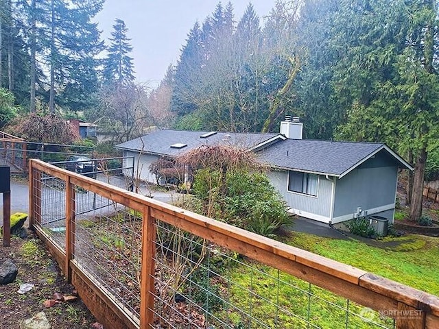 wooden deck featuring fence