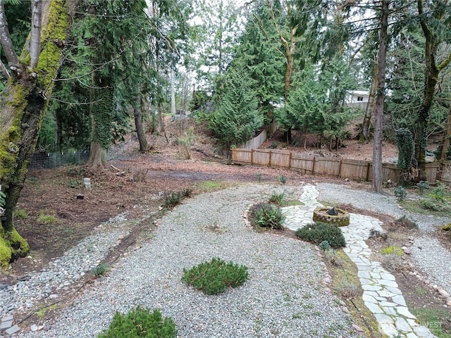 view of yard with fence