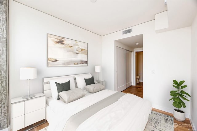 bedroom featuring hardwood / wood-style flooring