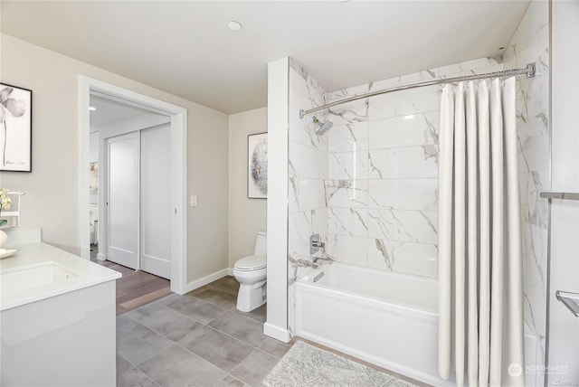 full bathroom featuring vanity, toilet, tile patterned flooring, and shower / bath combo