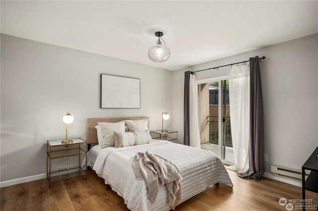 bedroom featuring dark wood-type flooring, a baseboard radiator, and access to outside