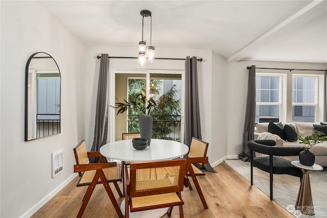 dining room featuring light wood-type flooring