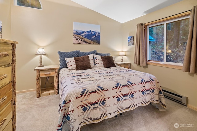 carpeted bedroom with vaulted ceiling, multiple windows, and a baseboard heating unit