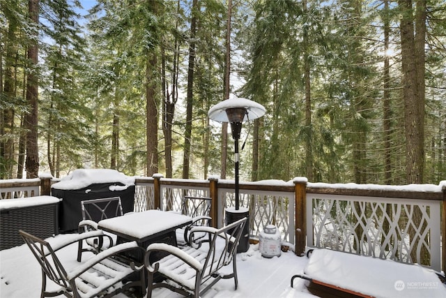 view of snow covered deck