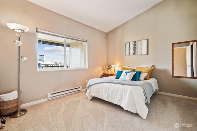 carpeted bedroom featuring vaulted ceiling and a baseboard heating unit