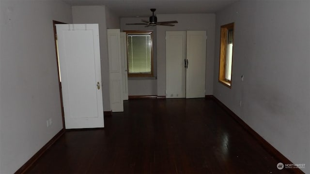 hall with dark hardwood / wood-style floors