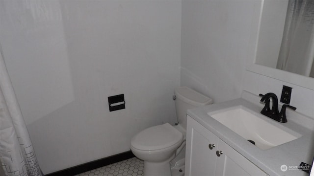 bathroom with vanity and toilet