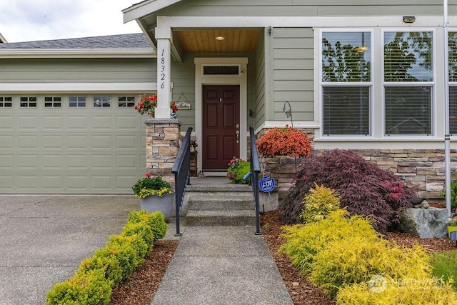 property entrance with a garage